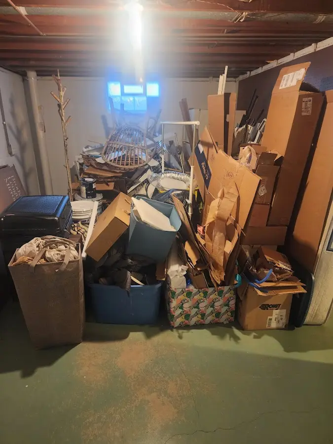 Roll-off dumpster container at job site for 4 Yard Dumpster Rental in Narragansett